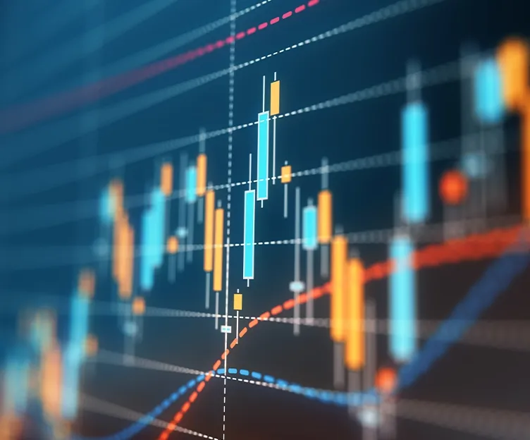 Close up image of data on a screen. Energy market analysis technology optimization.